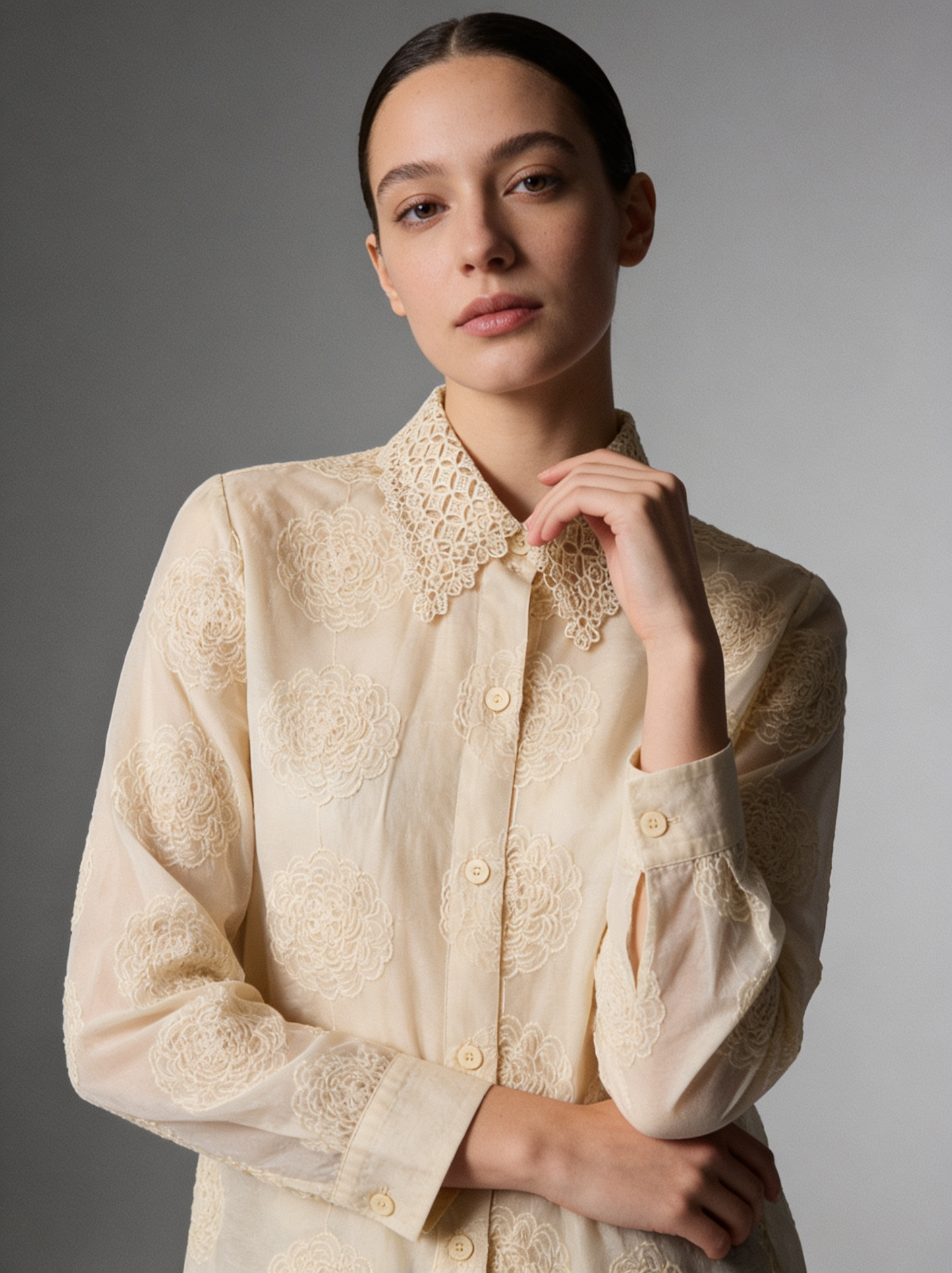 Embroidered women's shirt with raised flowers and a lace collar