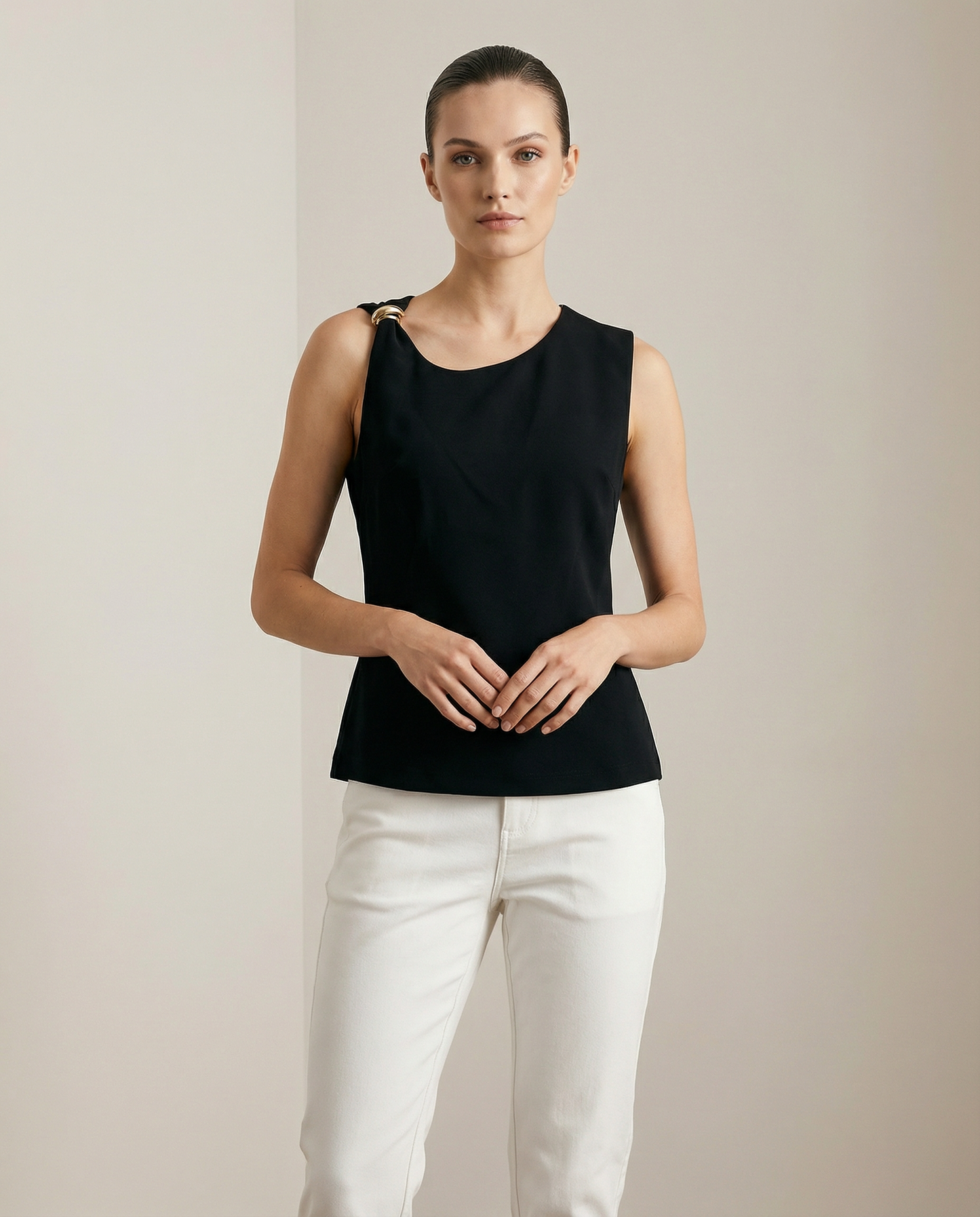 Sleeveless blouse with metallic details