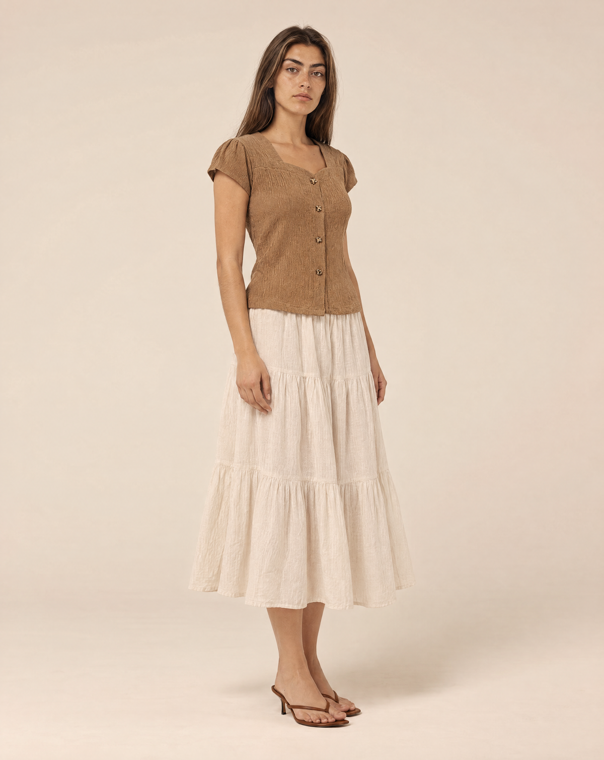 Blouse with gold buttons and short sleeves